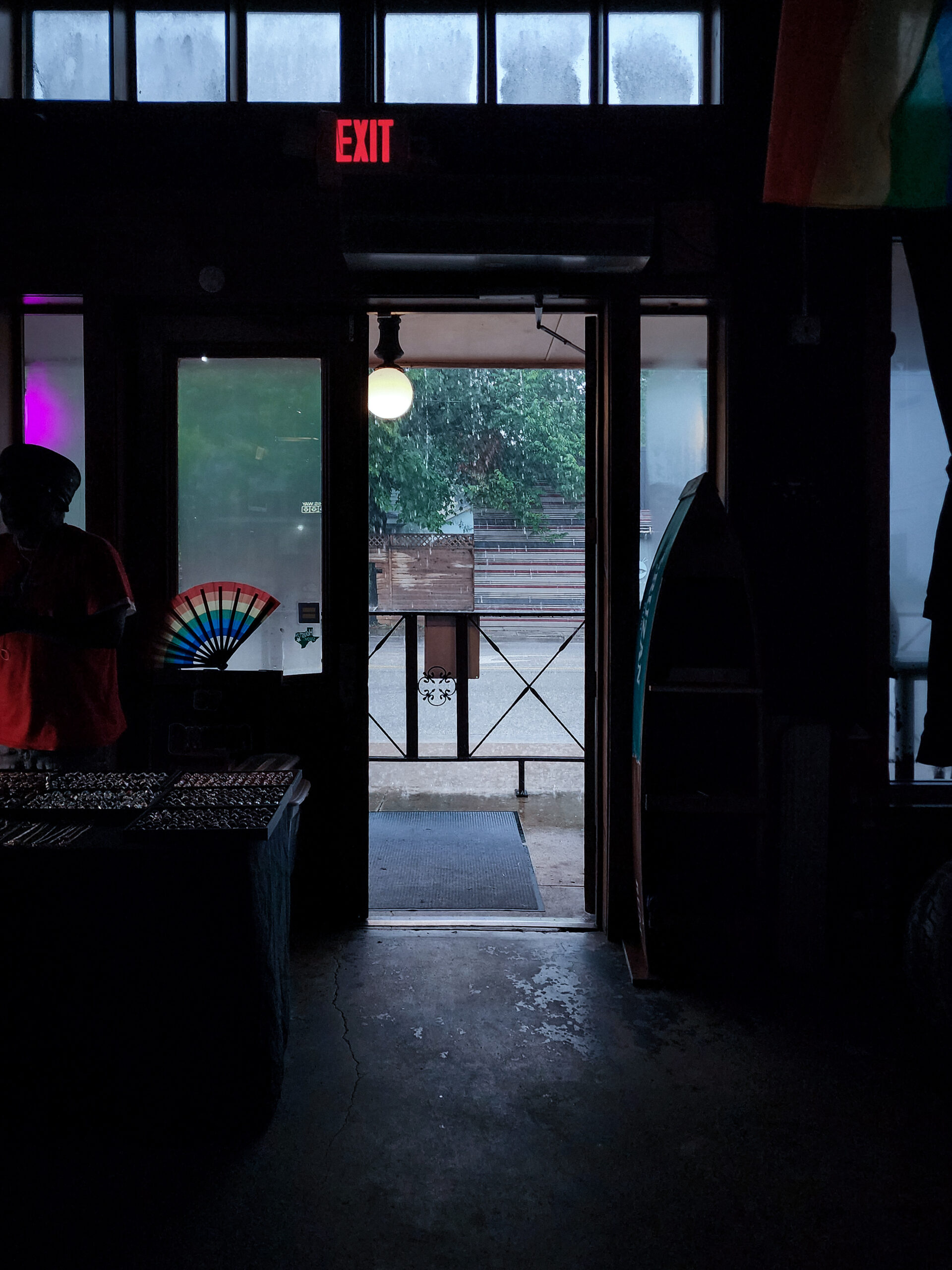 Open front door of Pearl Bar onto Washington Avenue as the bands of Hurricane Beryl begin.